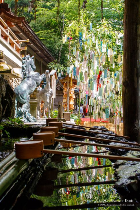 Water basin and tanabata bamboo during the Mizu Matsuri at Kifune shrine.