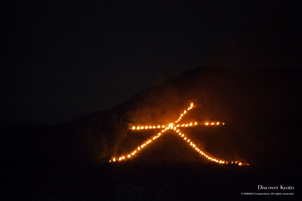 The famous Daimonji fire at the Arashiyama Gozan No Okurubi.