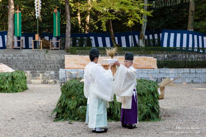 Priests offer up trays of gomagi during the Hitaki-sai Fire Festival at Fushimi Inari.
