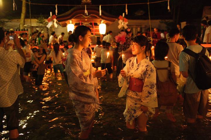 Ladies wear yukata summer kimono at Mitarashi Festival
