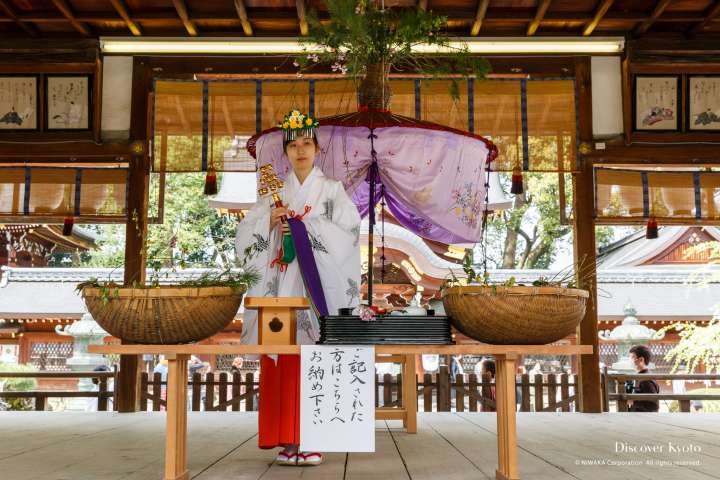 Blessings offered at Yasurai Matsuri at Imamiya Shrine.