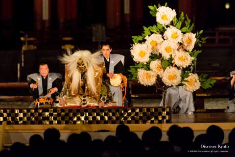 Actors on stage during Takigi Nō at Heian Shrine.