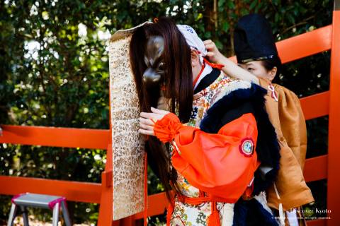 Bugaku dancer preparing during the Funeoka Taisai at Kenkun shrine.