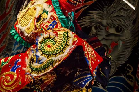 Actor with a sword during the Iwami Kagura at Yasaka Shrine.