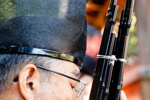 Musician and a shō, a classical Japanese instrument, during the Funeoka Taisai at Kenkun shrine.